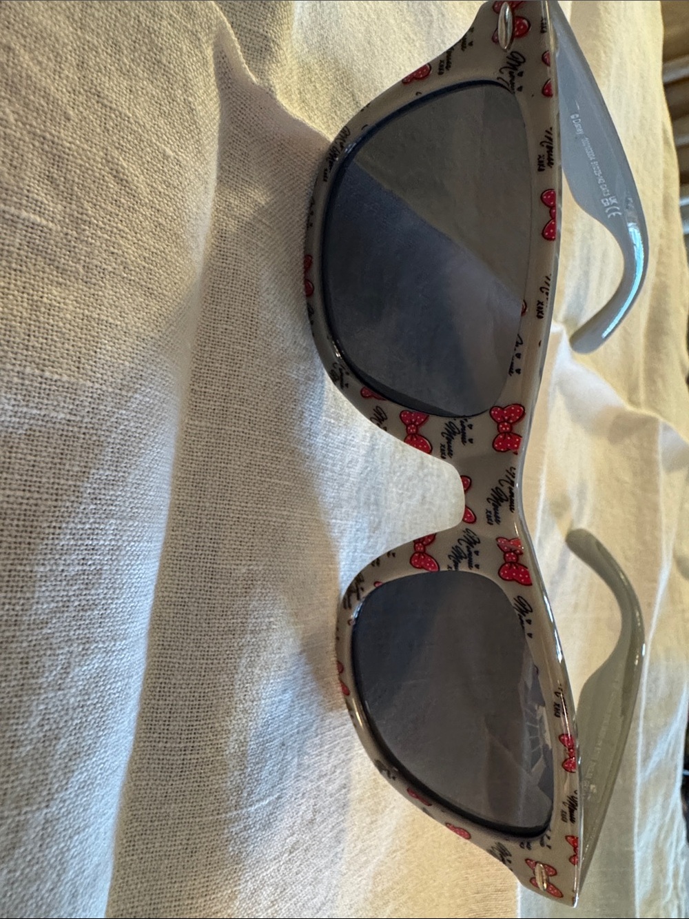 Disney Gray Sunglasses with Red Bow Print